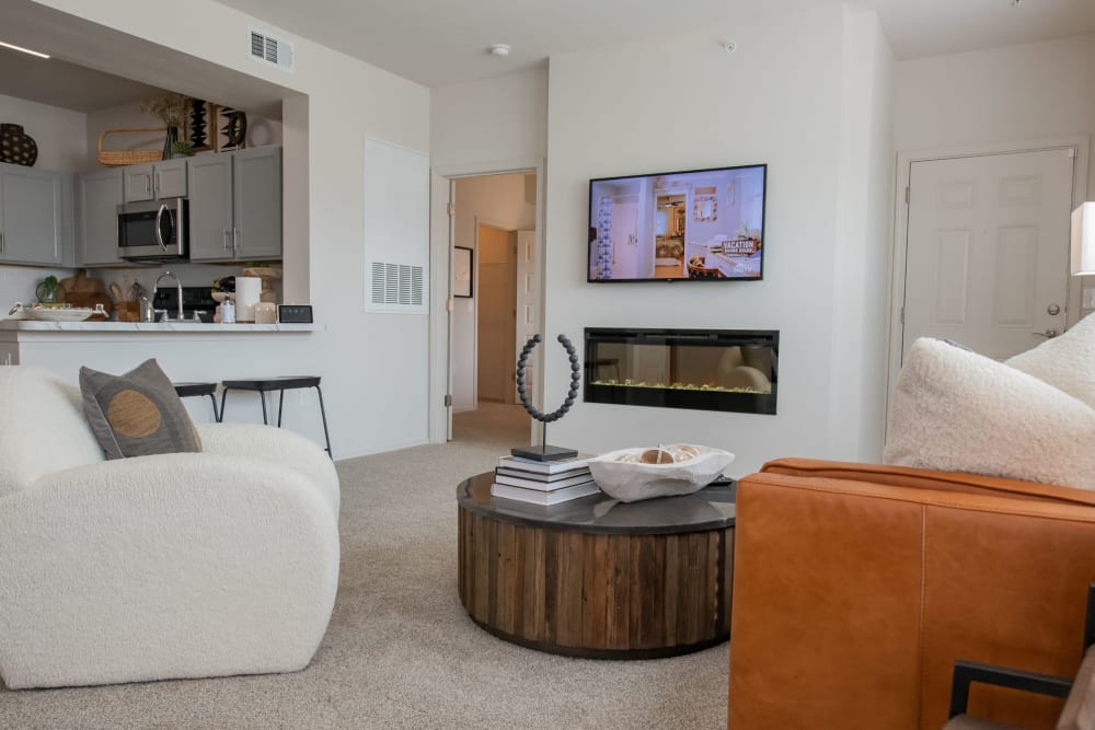 Living room at Center 301 Apartments in Belton, Missouri