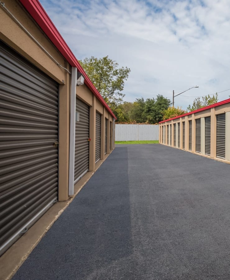 Outdoor drive-up storage units at StorQuest Economy Self Storage in Austin, Texas