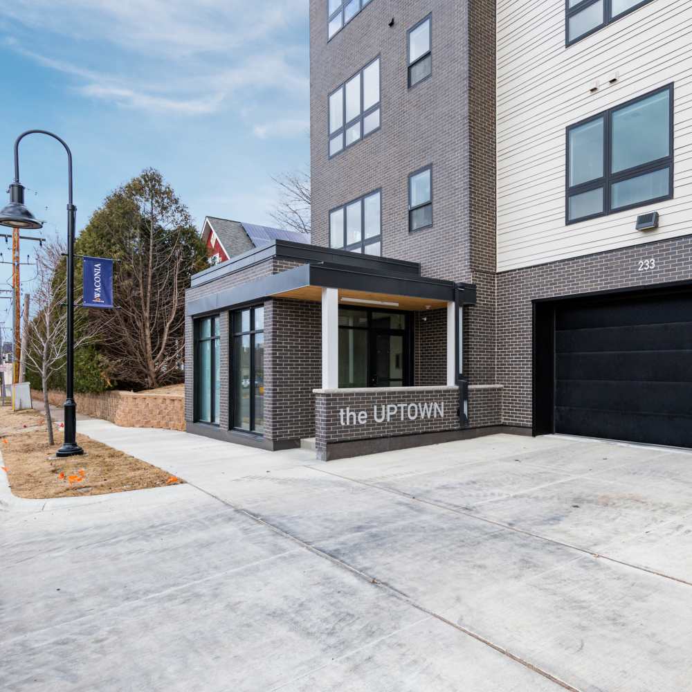 Entrance of apartments with signage at The Uptown Apartments in Waconia, Minnesota