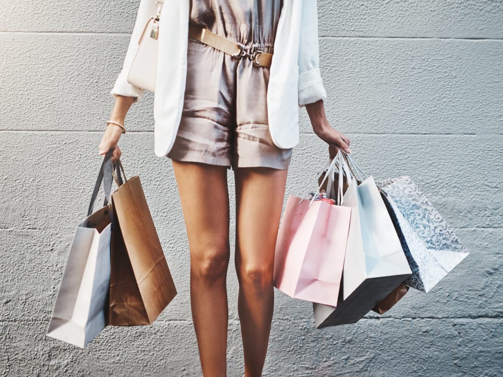 Woman with shopping bags near TerraLane on Cotton in Surprise, Arizona