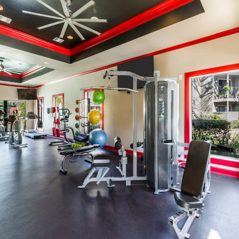 Equipment in the fitness center at 2400 Briarwest in Houston, Texas