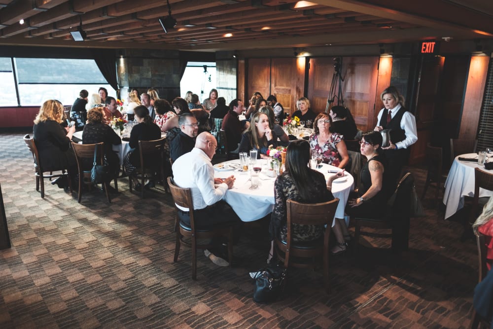 Employees gathered at an awards dinner for Ridgeline Management Company in Rockwall, Texas