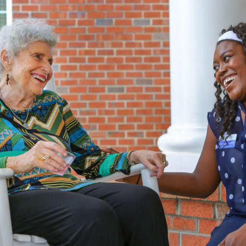 Resident and caregiver at The Crossings at Ironbridge in Chester, Virginia