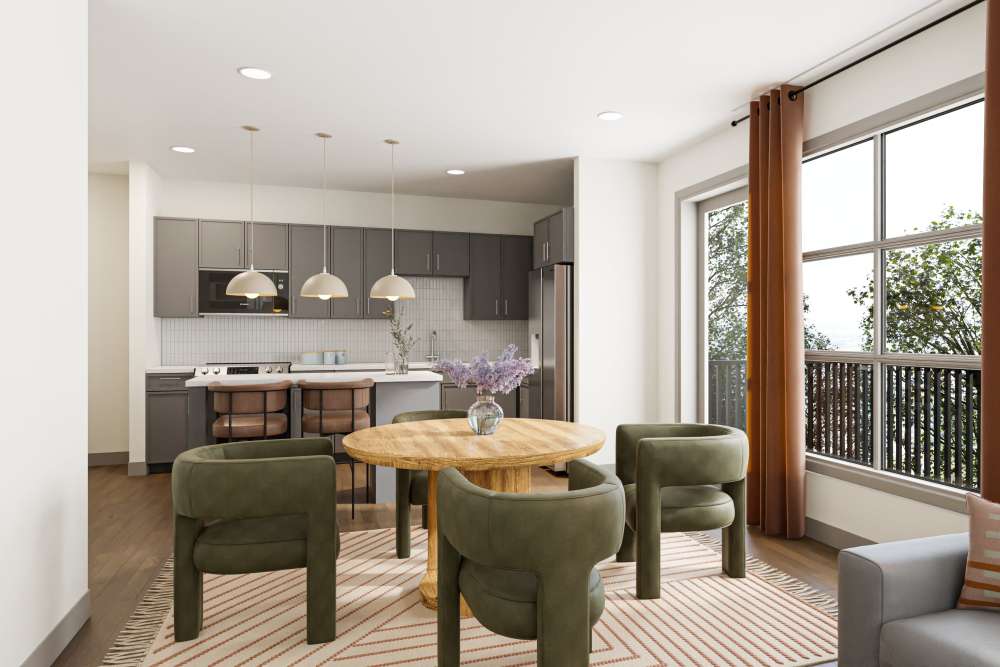 Spacious living room connected to kitchen and dining room at St. Albans Lofts in Raleigh, North Carolina