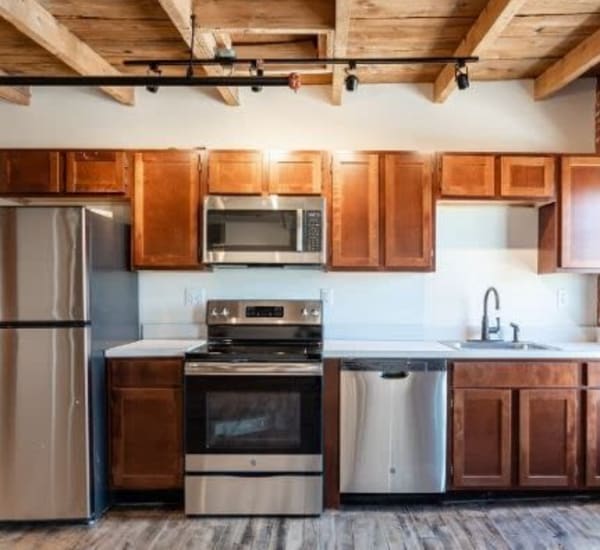 Fully equipped kitchen at Lofts at Cargill Falls Mill in Putnam, Connecticut