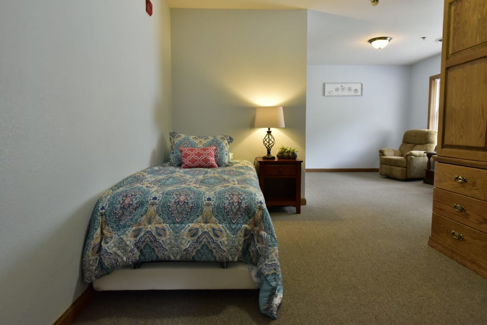 Spacious resident bedroom at Reflections at Garden Place in Columbia, Illinois.