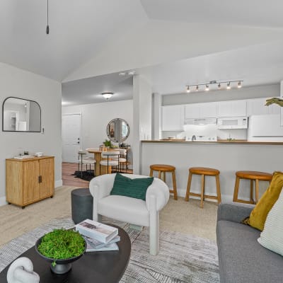 Modern living room in a open concept model home at Haven at Golf Creek in Portland, Oregon