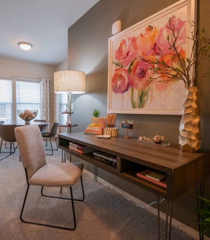 Desk set up with elegant painting at Stonehorse Crossing Apartments in Oklahoma City, Oklahoma