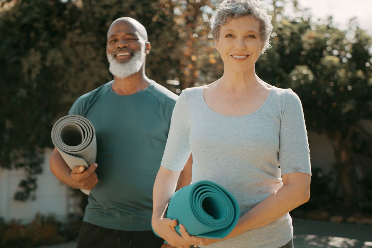 Residents returning home from yoga class at Monark Grove Clarkston in Clarkston, Michigan