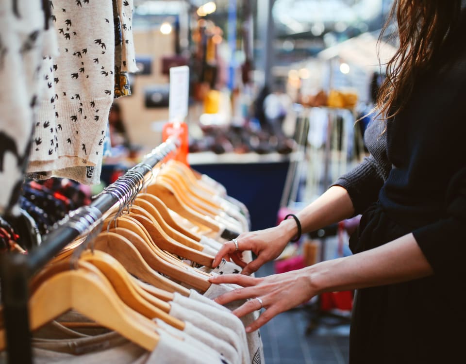 Resident shopping at a clothing boutique near Terra Martinez in Martinez, California