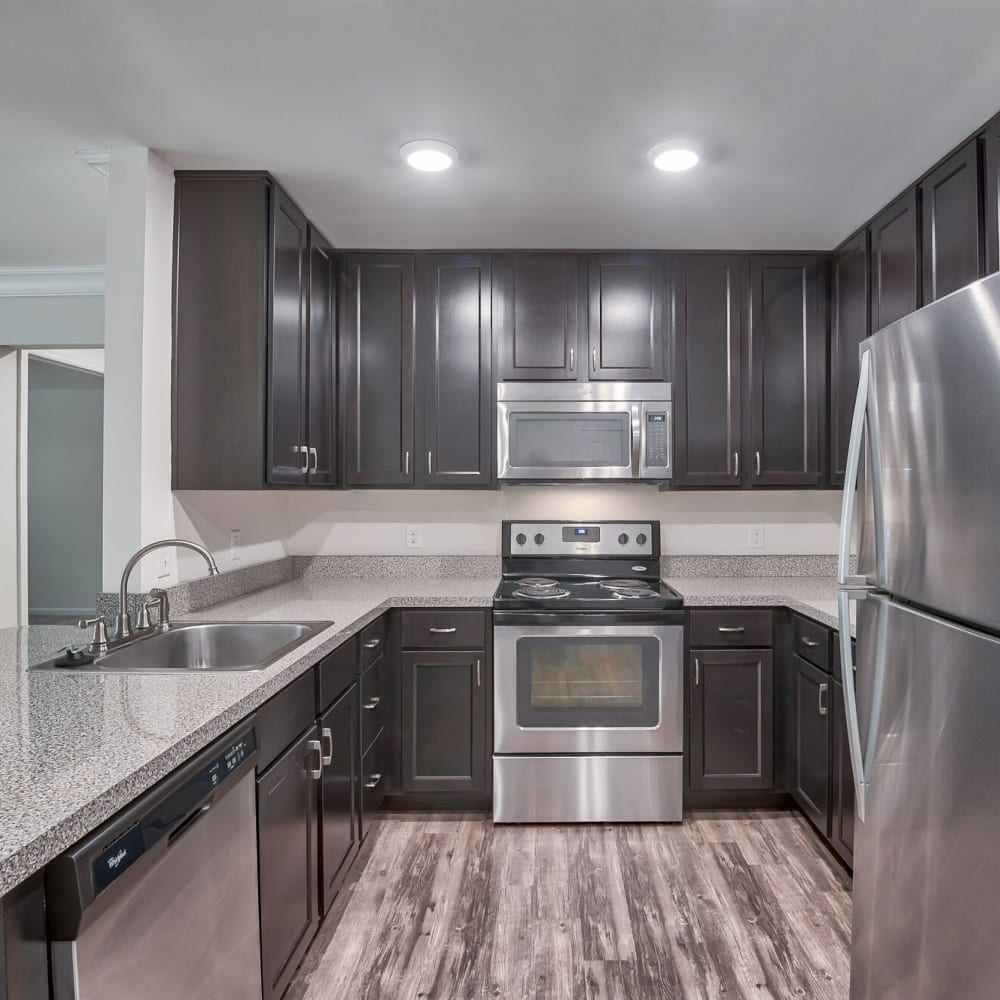 Kitchen with stainless-steel appliances at Highland Hills, Cumberland, Rhode Island