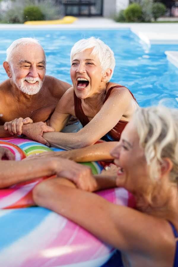 Residents enjoying in a swimming pool at Crescendo in Las Vegas, Nevada