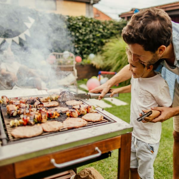 Father and son barbeque at The Carlton at Greenbrier, Chesapeake, Virginia