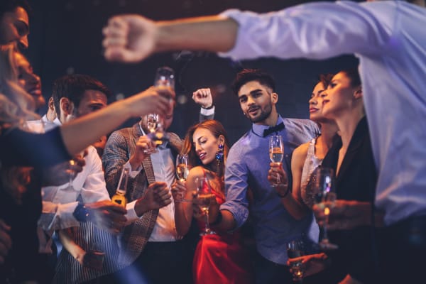 Friends enjoying drinks near Gramercy Scottsdale in Scottsdale, Arizona
