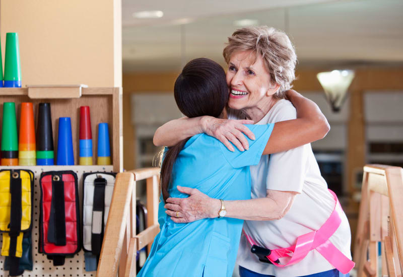 Resident and staff member hugging at St. Clair Nursing Center in Saint Clair, Missouri