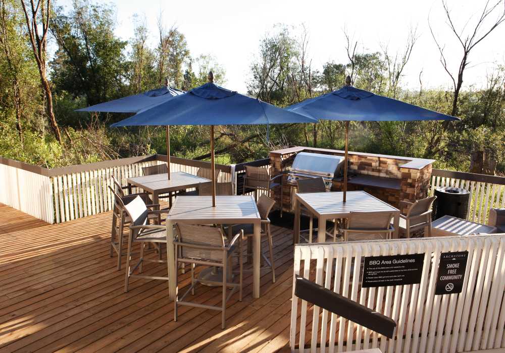 Outdoor seating with bbq at The Docks at Redmond Lakeview in Redmond, Washington