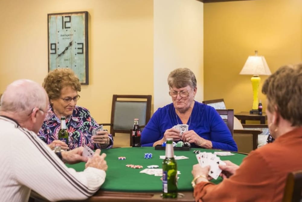 Residents playing cards at The Pointe at Summit Hills in Bakersfield, California. 
