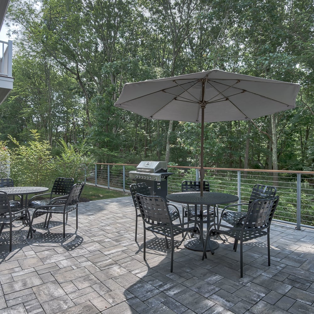 Barbeque area with tables and chairs at 60 Mansfield Road, New London, Connecticut