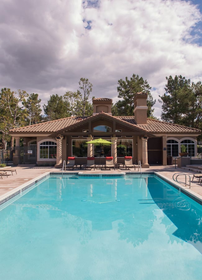 Swimming poll with a large sun deck at Paloma Summit Condominium Rentals in Foothill Ranch, California