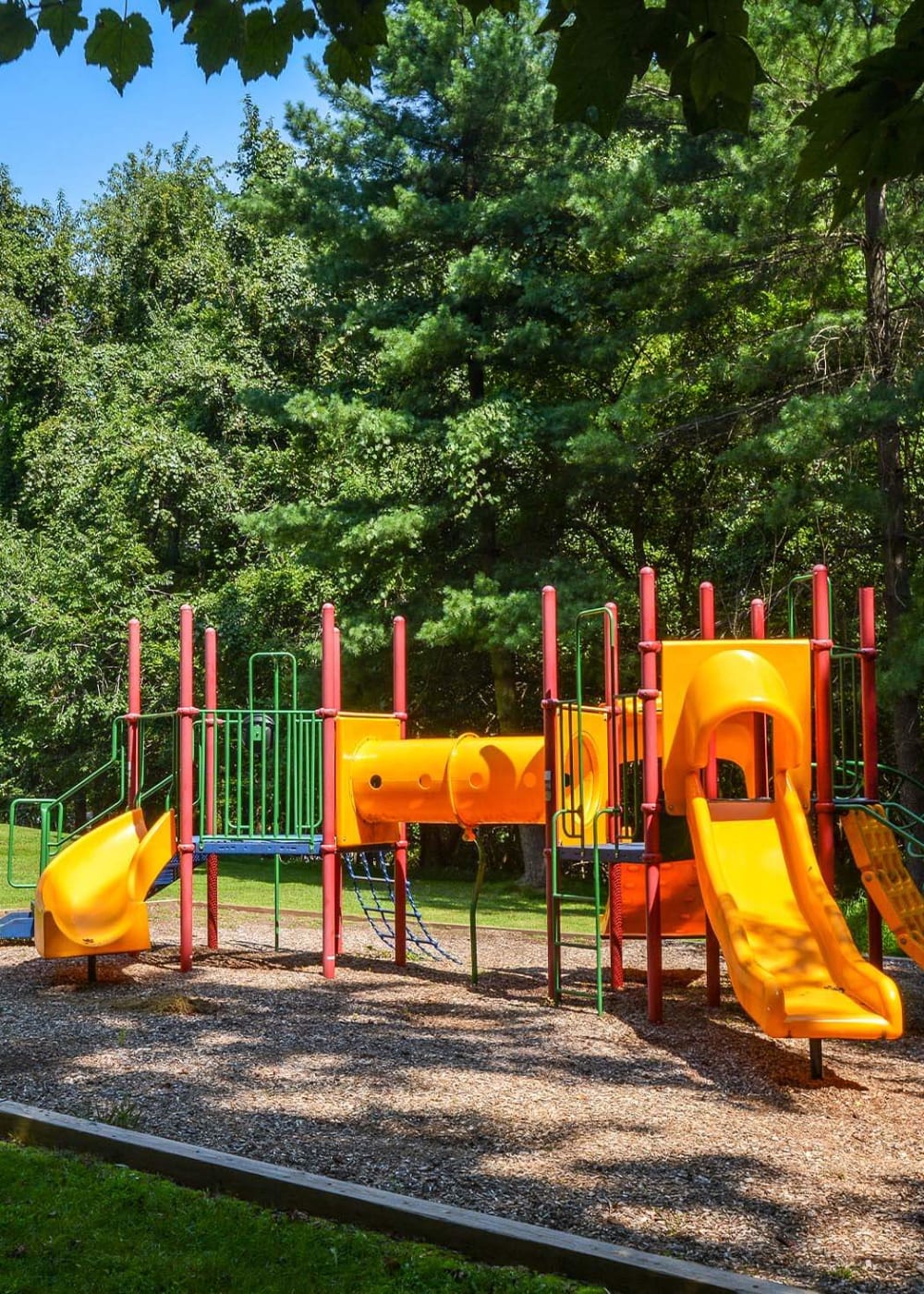 Children's outdoor playground area at Yorkshire Apartments in Silver Spring, Maryland