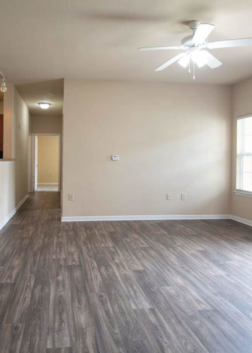 Unfurnished living room with wood-style flooring at The Summits in Graniteville, South Carolina
