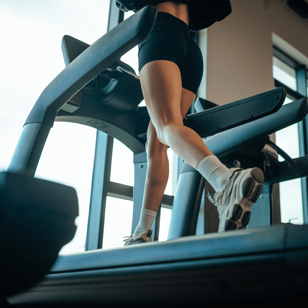 Woman running on a treadmill at Savelle Nona West in Orlando, Florida