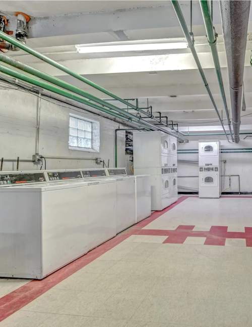 Washer and dryer facility at Chatham Grove Apartments in Chicago, Illinois