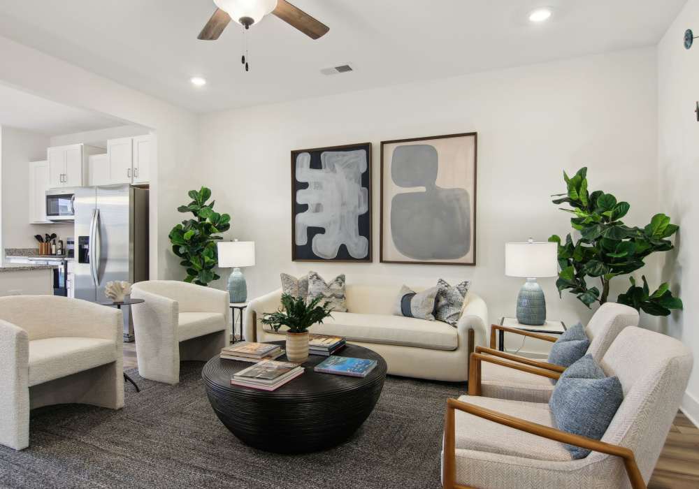 Stylish living room with neutral color palette at Artisan Living Mills River in Mills River, North Carolina