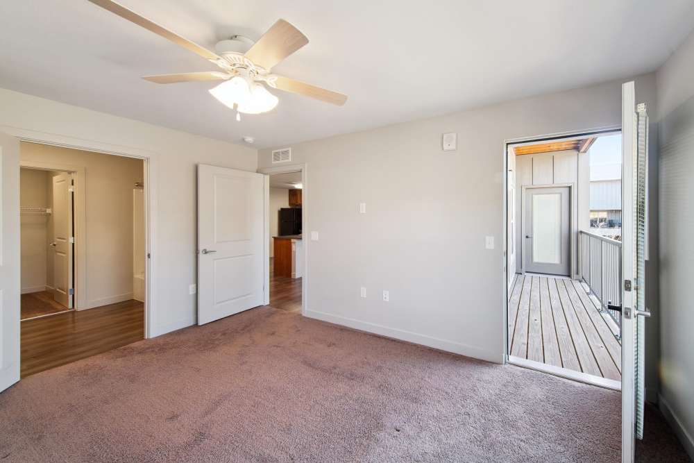 Bedroom with close access to balcony at Villas At Mesa Ridge in Fountain,Colorado