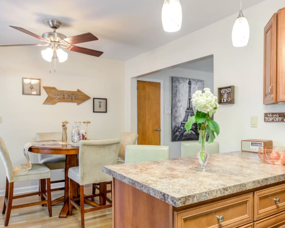 Modern kitchen and dining room at Royal Court Apartments in River Edge, New Jersey