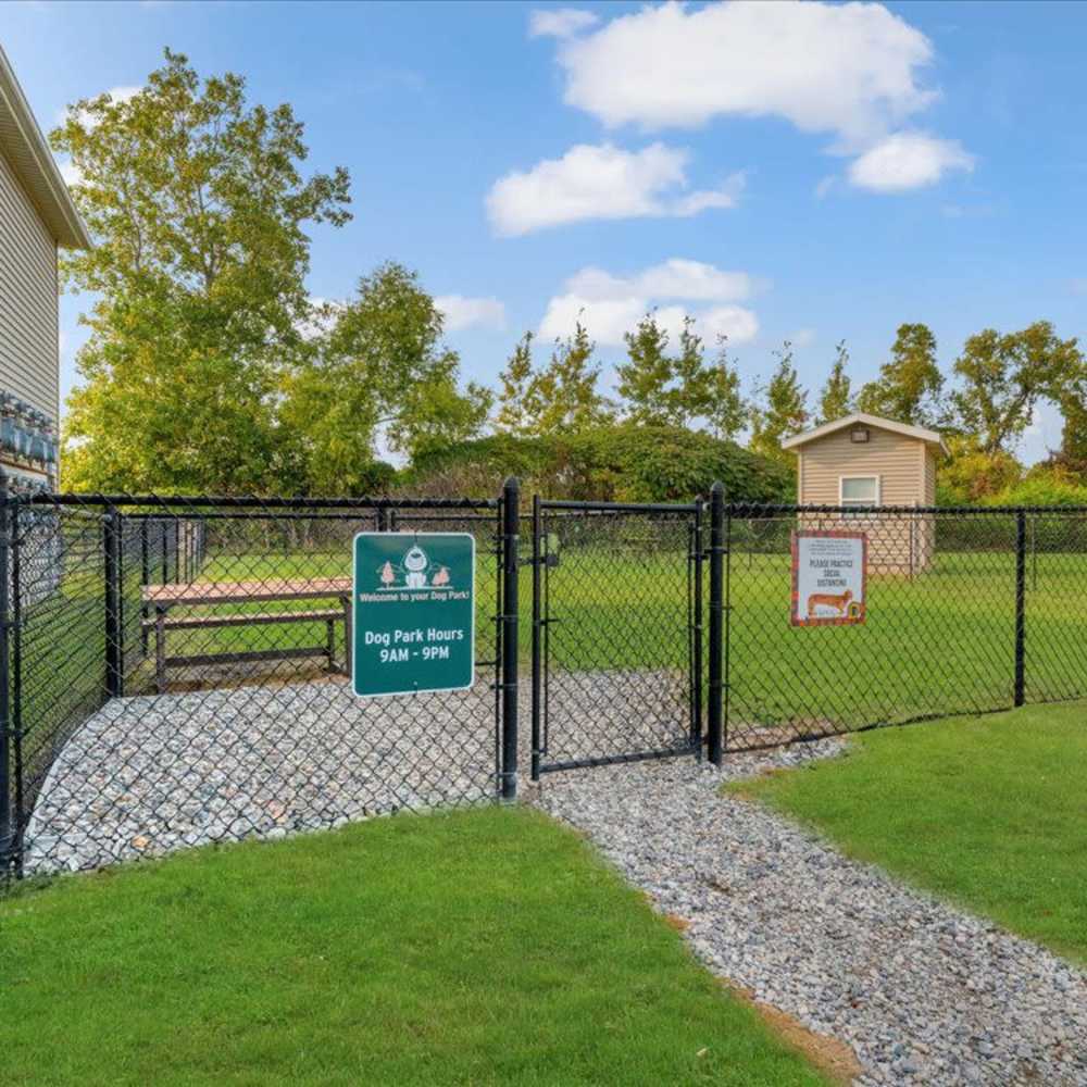 Pet park with fenced outdoor space at River Club in Holland, Michigan