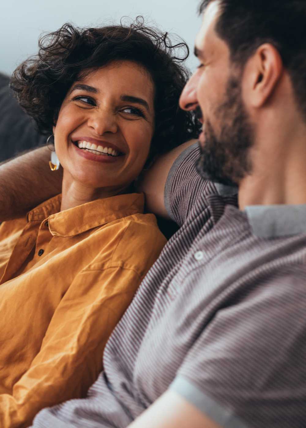 Happy resident couple in the apartment at Ridge Commons in Lafayette, Louisiana