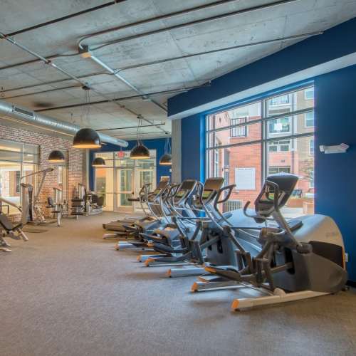 Fitness center with multiple equipment at Overton Row in Charlotte, North Carolina