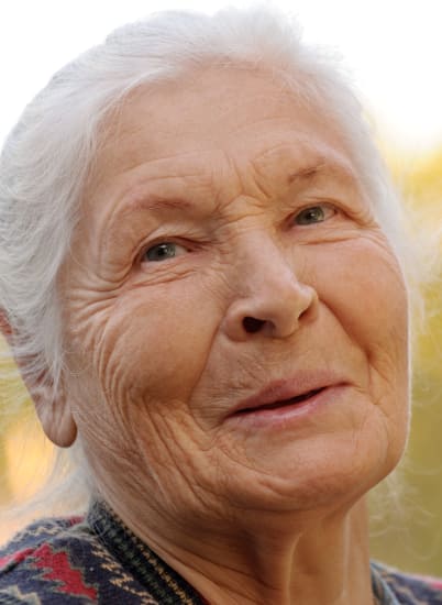 Resident enjoying living in comfort at MuirWoods Memory Care