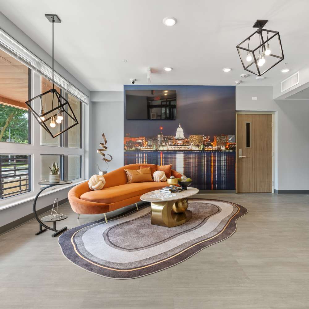 Community building with signage at The Flats At 402 in Madison, Wisconsin