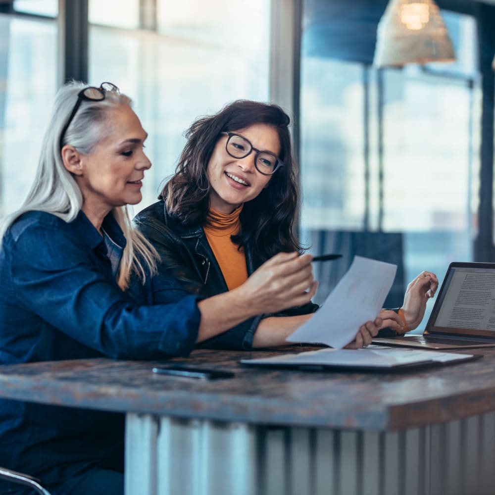 Women working together at Cambridge Management Company in Santa Clara, California