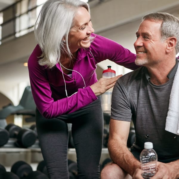 Residents exercise in the fitness center at Alate Old Town, Alexandria, Virginia