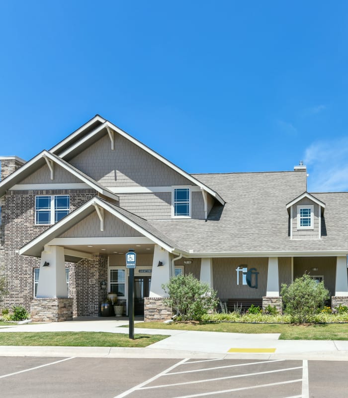 Front entrance to Cottages at Abbey Glen Apartments in Lubbock, Texas