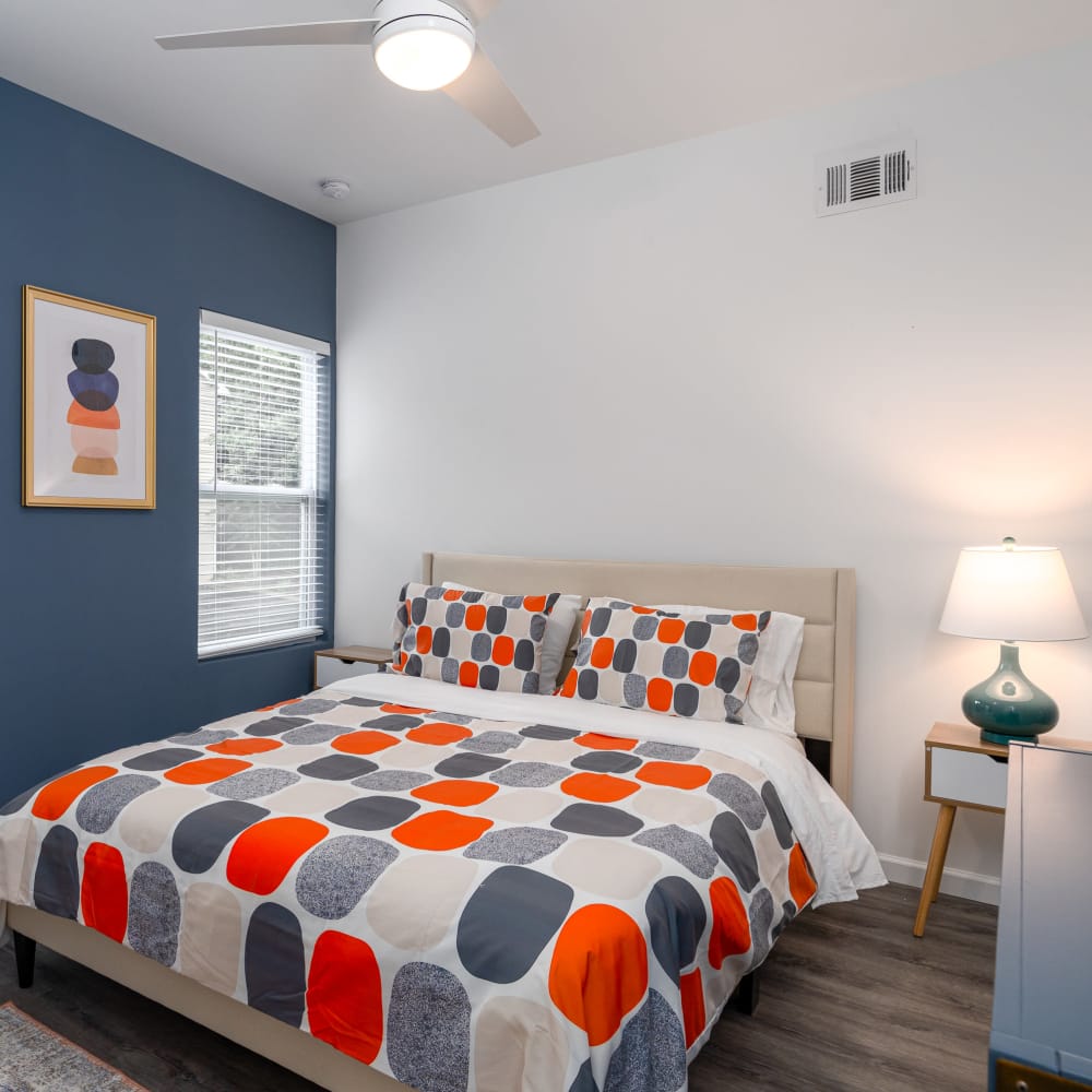 A well-lit bed in a bedroom at Park Canyon in Dalton, Georgia