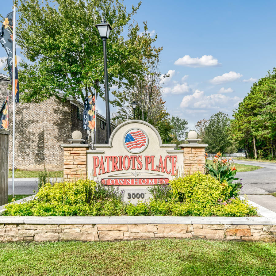 Sidewalks and signage outside of Patriot's Place Townhomes in Goose Creek, South Carolina