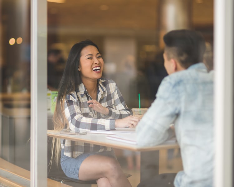 Residents enjoying coffee and good conversation at a café near Terra Martinez in Martinez, California