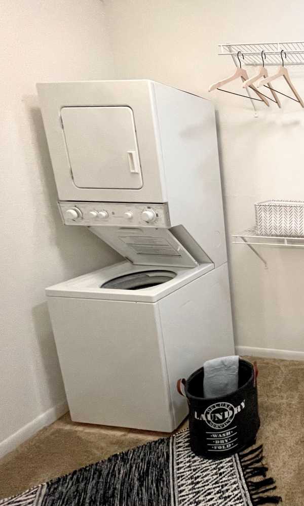 Stack Washer & Dryer inside the closet at The Abbey at Briargrove Park in Houston, Texas