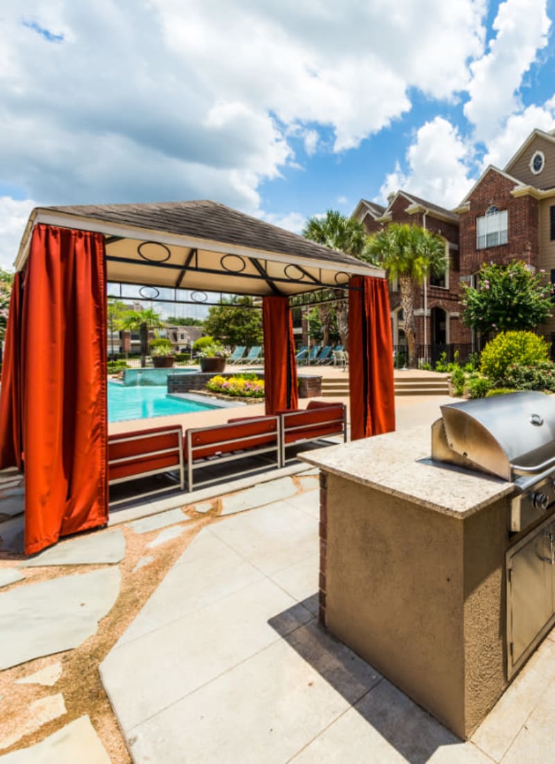 Stainless steel BBQs behind gazebos Marquis on Park Row in Houston, Texas