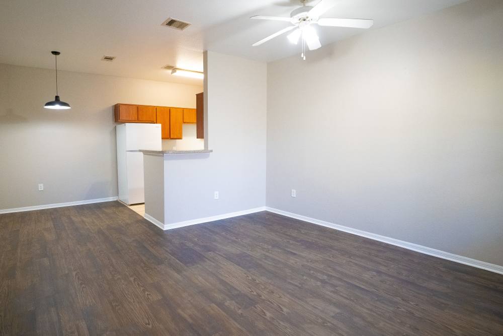 Kitchen and living area of townhomes at Millpoint Townhomes in Henderson, Texas