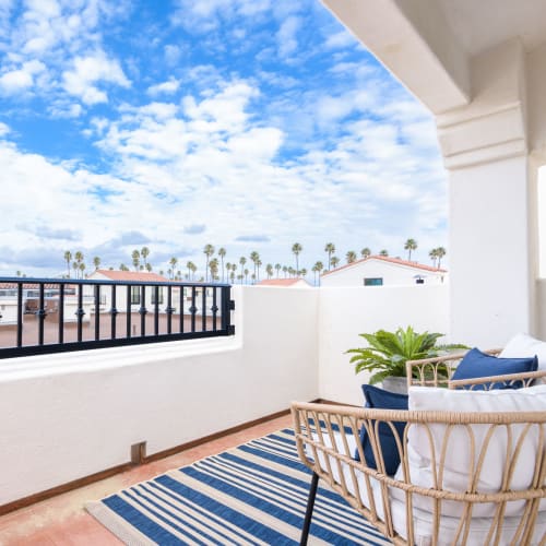 Spacious private balcony outside a model home at Portside Ventura Harbor in Ventura, California