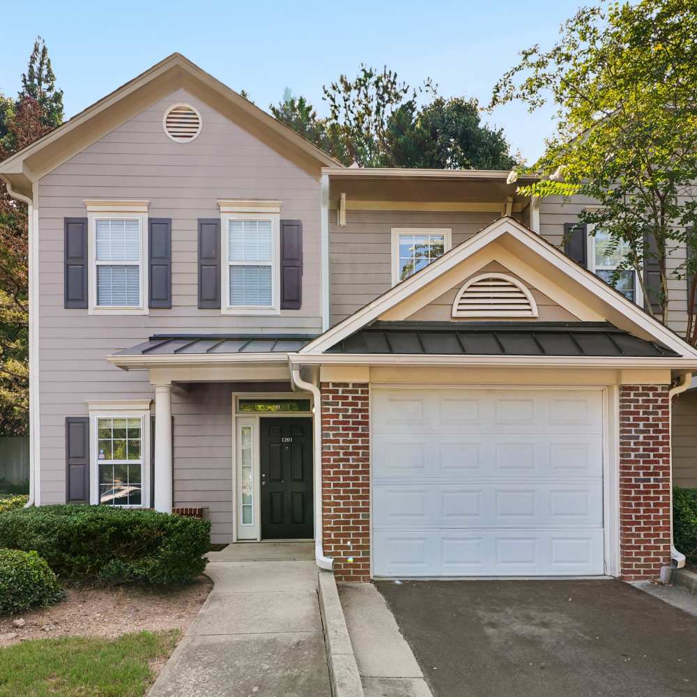 Townhome exterior at The Grove at Ben Hill apartments in Atlanta, GA