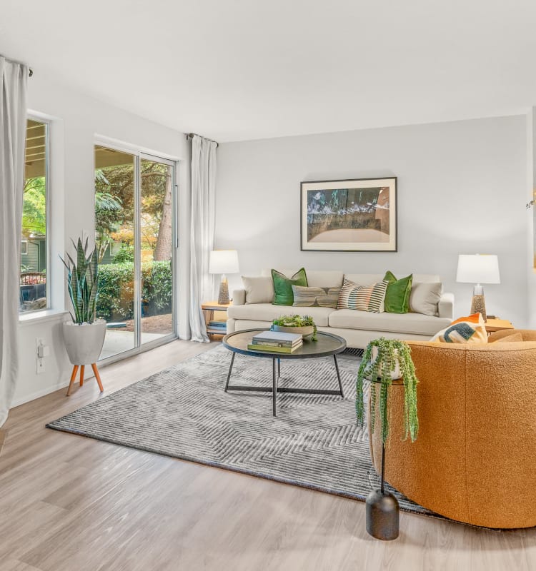 Carpeted living room at Terra at Hazel Dell in Vancouver, Washington