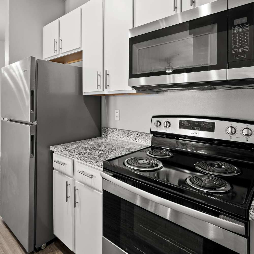 Kitchen withh white cabinetry at Retreat at Horizon Hills in El Paso, Texas