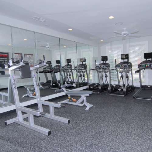 Fitness center with treadmills at Haven at Wild Dunes in Newport, North Carolina