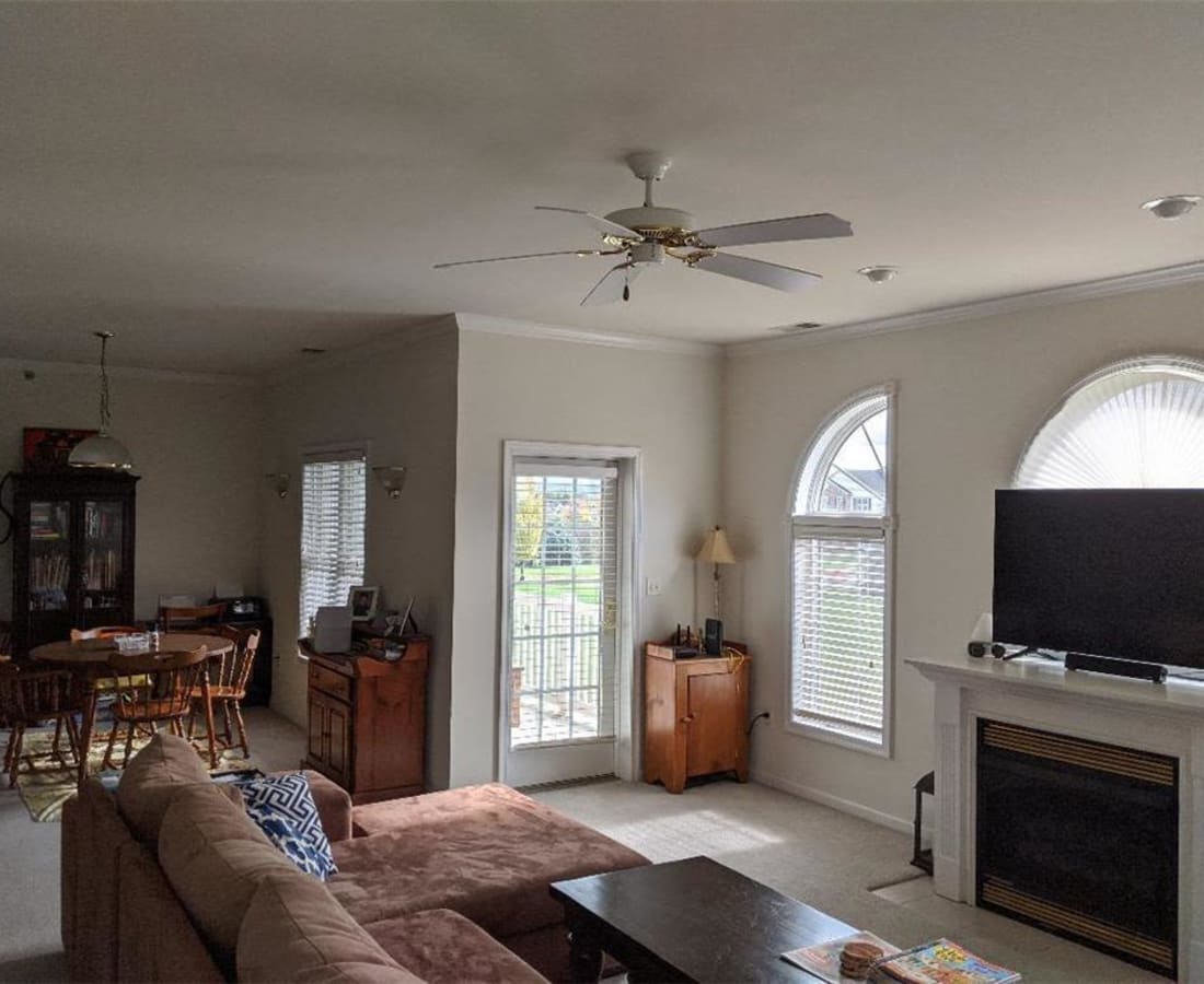 Large spacious living room with fireplace at Springhouse Townhomes in Allentown, Pennsylvania